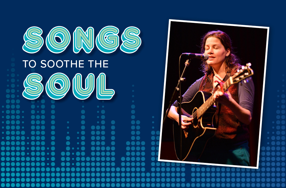 Songs to Soothe the Soul Music therapist Anna S. Cephas plays the guitar.